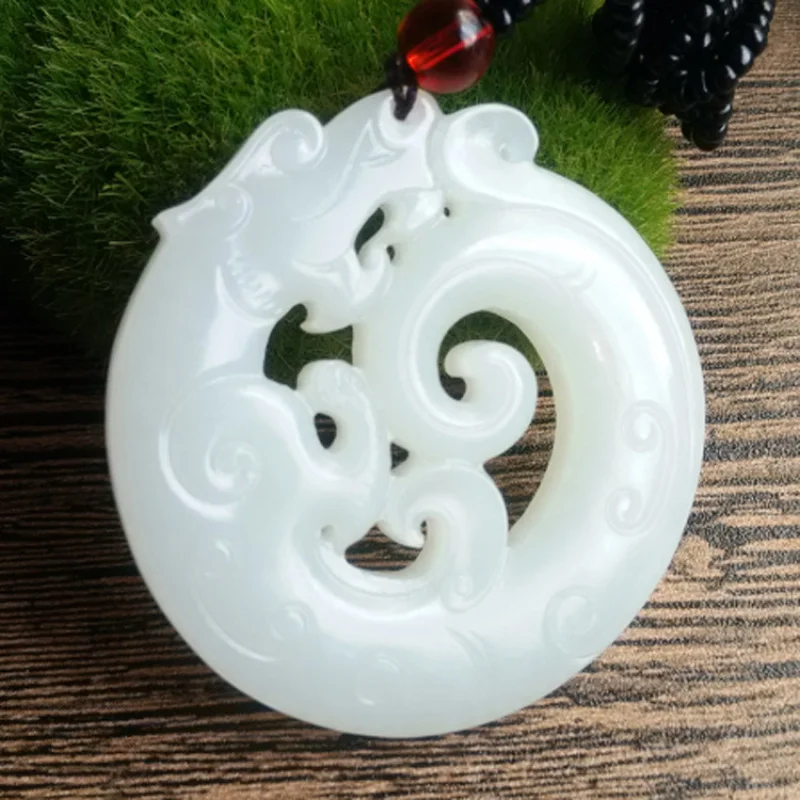 Handmade natural stone Hetian white jade hollow pendant men and women
Handmade natural stone Hetian white jade hollow pendant men and women