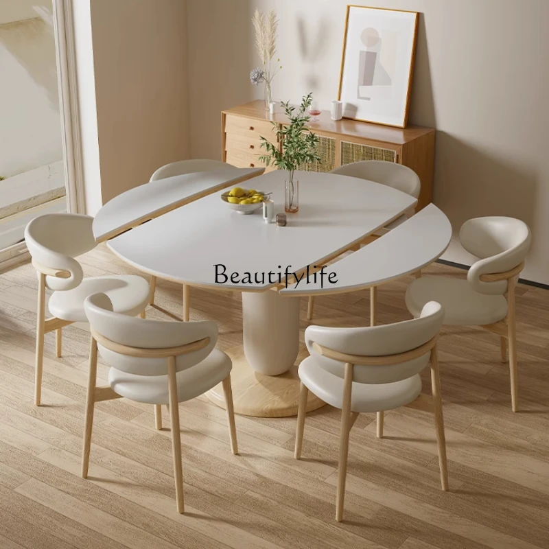 Dual-purpose rock slab round stretchable cream wind retractable folding small apartment log table
Dual-purpose rock slab round stretchable cream wind retractable folding small apartment log table