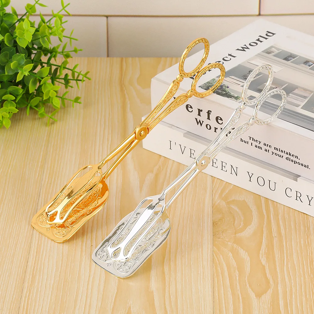 European light luxury cake clip, pattern engraving non-slip birthday party cake clip, alloy handicraft clip
European light luxury cake clip, pattern engraving non-slip birthday party cake clip, alloy handicraft clip