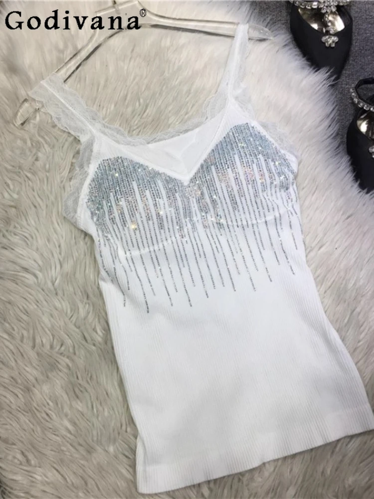 European Heavy Industry Hot Diamond Wide Shoulder Strap White Lace Bottoming Top Girl 2025 Summer New Outer Wear Suspender Vest
European Heavy Industry Hot Diamond Wide Shoulder Strap White Lace Bottoming Top Girl 2025 Summer New Outer Wear Suspender Vest