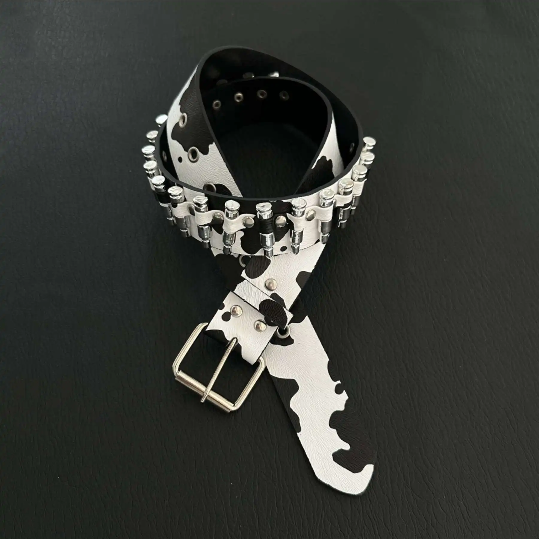 Black and white cow print bullet belt, versatile and unique, high-end belt, hip-hop style outfit accessory
Black and white cow print bullet belt, versatile and unique, high-end belt, hip-hop style outfit accessory