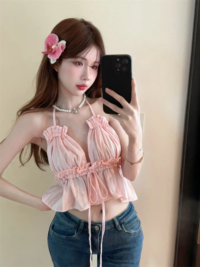 Korean version of summer new vacation style sexy lace up open back camisole shirt short sleeved top for women
Korean version of summer new vacation style sexy lace up open back camisole shirt short sleeved top for women