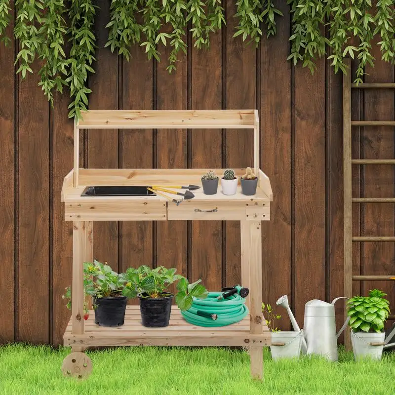 Outsunny 36" Wooden Potting Bench Work Table with 2 Removable Wheels, Garden Workstation with Removable Sink, Drawer & Large Storage Spaces, Natural
Outsunny 36" Wooden Potting Bench Work Table with 2 Removable Wheels, Garden Workstation with Removable Sink, Drawer & Large Storage Spaces, Natural