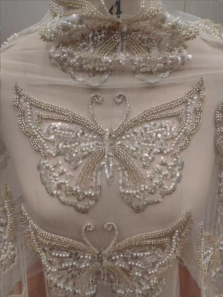 Высококачественная великолепная кружевная ткань с бабочками из бисера и кружевной тканью с глубокими блестками для свадебного платья 
Высококачественная великолепная кружевная ткань с бабочками из бисера и кружевной тканью с глубокими блестками для свадебного платья