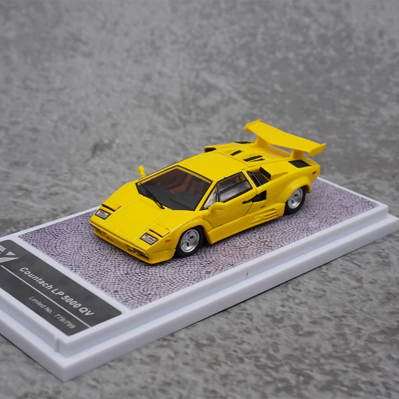 Модель автомобиля Lamborghini Countach LP5000 из сплава под давлением в масштабе 1:64, классические подарки для взрослых, коллекция сувениров, статический дисплей
Модель автомобиля Lamborghini Countach LP5000 из сплава под давлением в масштабе 1:64, классические подарки для взрослых, коллекция сувениров, статический дисплей