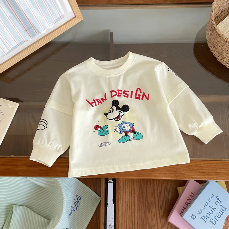 Детская футболка с длинным рукавом и принтом Микки Мауса, новинка весны 2026 года, повседневная удобная футболка с круглым вырезом и капюшоном для мальчиков
Детская футболка с длинным рукавом и принтом Микки Мауса, новинка весны 2026 года, повседневная удобная футболка с круглым вырезом и капюшоном для мальчиков
