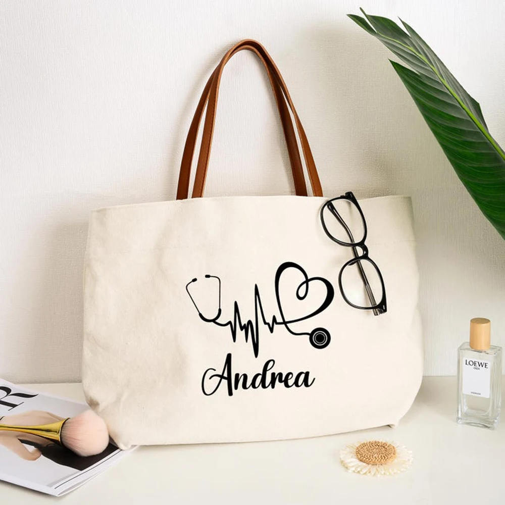Durable Personalized Nurse Tote Bag Spacious Custom Name Canvas Shoulder Bag Simple Stethoscope Nurse Nursing Graduation Gift
Durable Personalized Nurse Tote Bag Spacious Custom Name Canvas Shoulder Bag Simple Stethoscope Nurse Nursing Graduation Gift