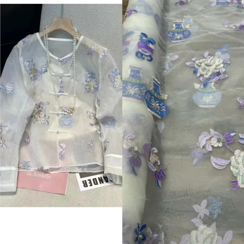 A new Chinese-style silk organza embroidered fabric elegant coat set made of pure
A new Chinese-style silk organza embroidered fabric elegant coat set made of pure