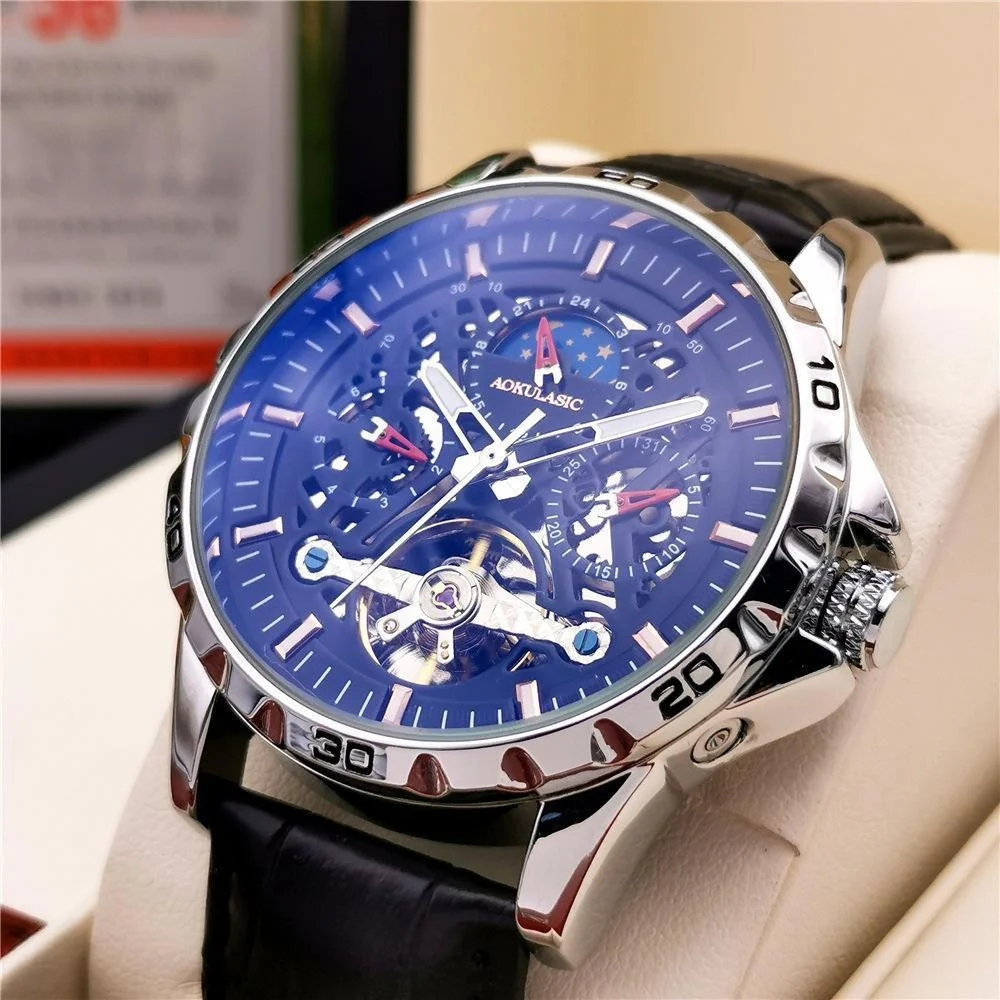 Высококлассные деловые роскошные мужские механические часы в европейском и американском стиле, круглый циферблат, дизайн скелета, автоматический заводной, кожаный ремешок, новые высококачественные легкие роскошные модные повседневные простые модные мужски
Высококлассные деловые роскошные мужские механические часы в европейском и американском стиле, круглый циферблат, дизайн скелета, автоматический заводной, кожаный ремешок, новые высококачественные легкие роскошные модные повседневные простые модные мужски