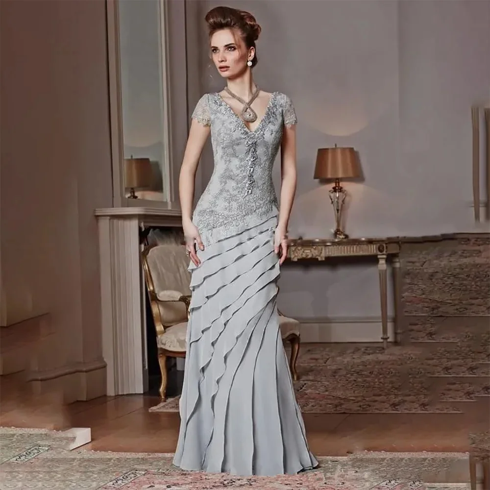Elegant Short Sleeve Lace Silver Mother Of The Bride DressesAppliqued Formal Evening Gowns Floor Length Ruffles 2024 New
Elegant Short Sleeve Lace Silver Mother Of The Bride DressesAppliqued Formal Evening Gowns Floor Length Ruffles 2024 New
