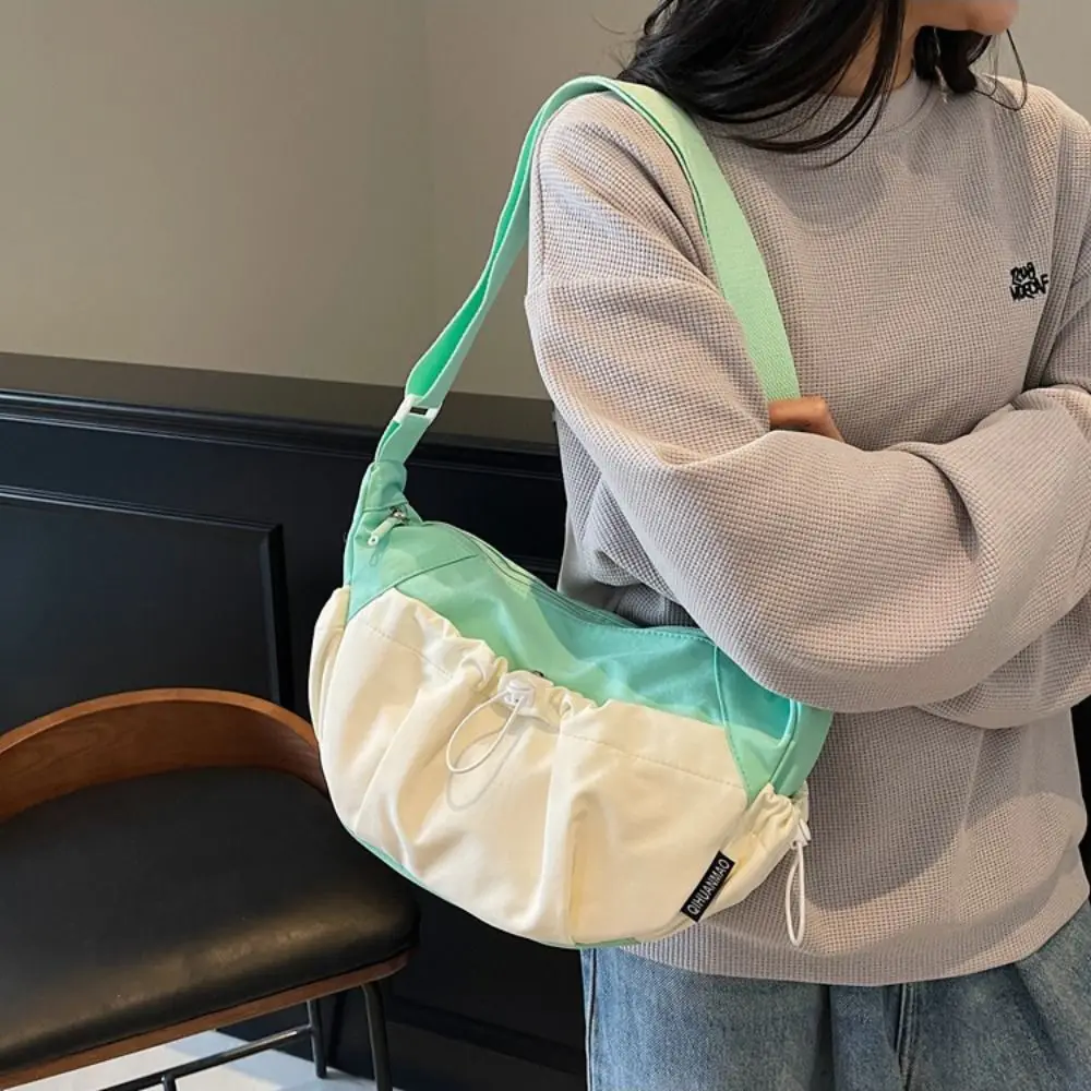 Mini Contrast Color Nylon Crossbody Bag Drawstring Solid Color Dumplings Shoulder Bag Portable Luxury Fashion Handbag Decoration
Mini Contrast Color Nylon Crossbody Bag Drawstring Solid Color Dumplings Shoulder Bag Portable Luxury Fashion Handbag Decoration