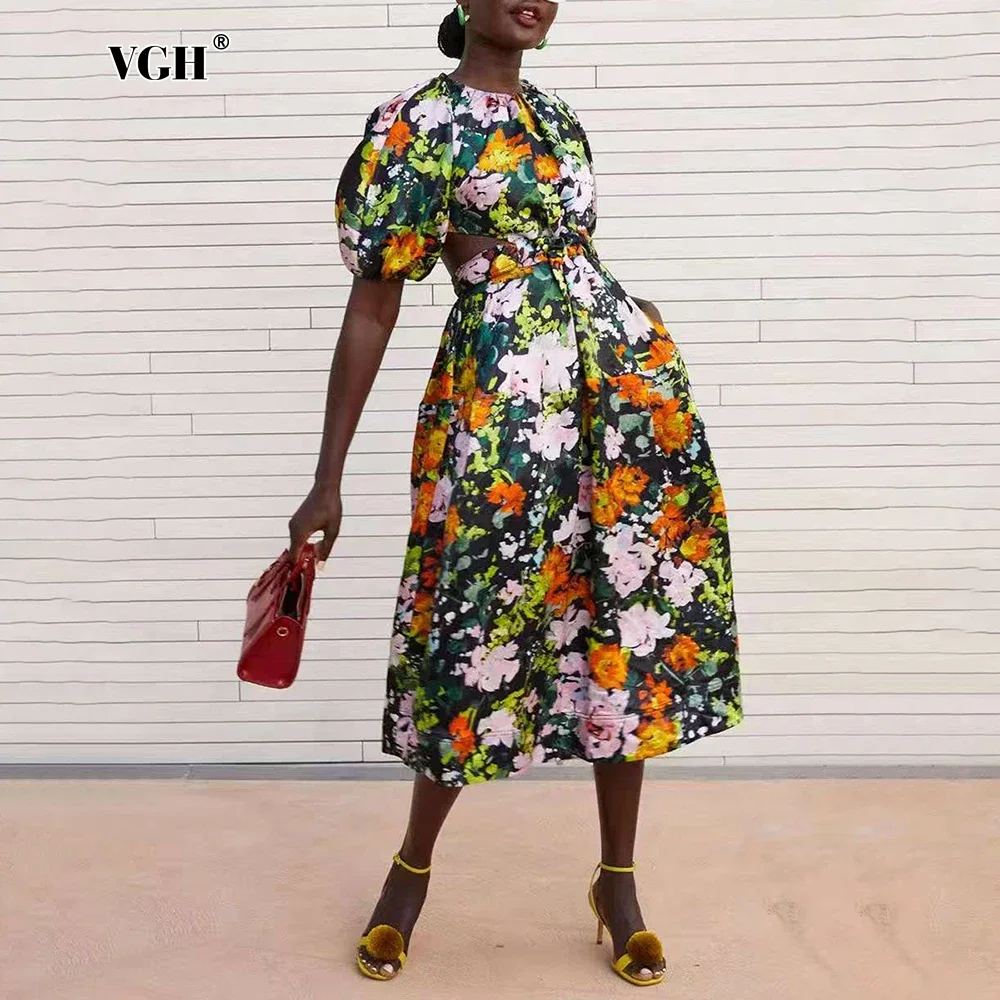 VGH Colorful Floral Printing Spliced Lace Up Midi Dress for Women O Neck Short Sleeve High Waist Cutout Designer Dresses Female
VGH Colorful Floral Printing Spliced Lace Up Midi Dress for Women O Neck Short Sleeve High Waist Cutout Designer Dresses Female