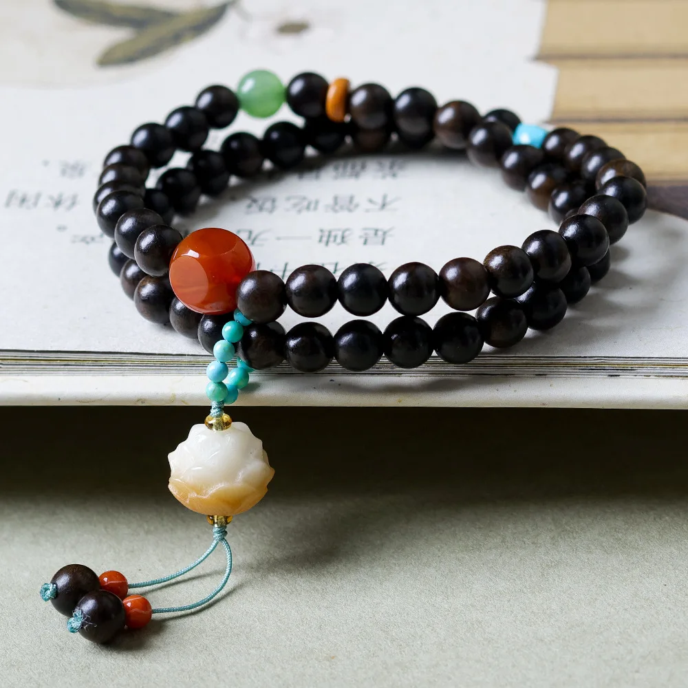 Medicinal agarwood two circle bracelet, Bodhi root lotus flower, Chinese style Buddhist bead bracelet, and cultural toys
Medicinal agarwood two circle bracelet, Bodhi root lotus flower, Chinese style Buddhist bead bracelet, and cultural toys