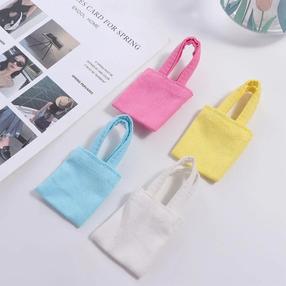 Changing Dressing Doll Canvas Bag Doll Backpacks Decor Toys Doll Handbag Dress Up Multicolor Miniature Doll Bag Photo Props
Changing Dressing Doll Canvas Bag Doll Backpacks Decor Toys Doll Handbag Dress Up Multicolor Miniature Doll Bag Photo Props
