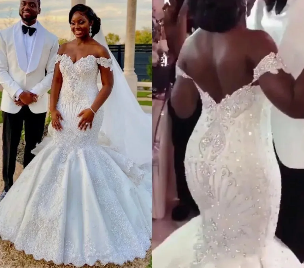 Luxury African Mermaid Wedding Dresses 2025 Off Shoulder Backless Crystal Rhinestones Bridal Gowns Vestidos De Noiva Customized
Luxury African Mermaid Wedding Dresses 2025 Off Shoulder Backless Crystal Rhinestones Bridal Gowns Vestidos De Noiva Customized