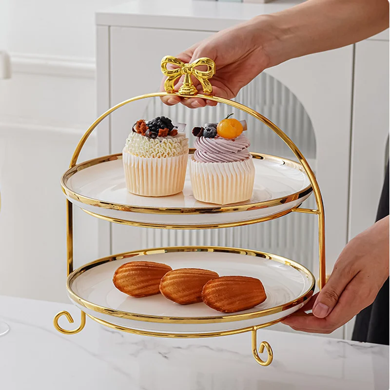 Golden Edged Double-layer Ceramic Tray, Cake Rack, Snack, Fruit Tray, Afternoon Tea Dessert Display Stand, Metal Bow Bracket
Golden Edged Double-layer Ceramic Tray, Cake Rack, Snack, Fruit Tray, Afternoon Tea Dessert Display Stand, Metal Bow Bracket