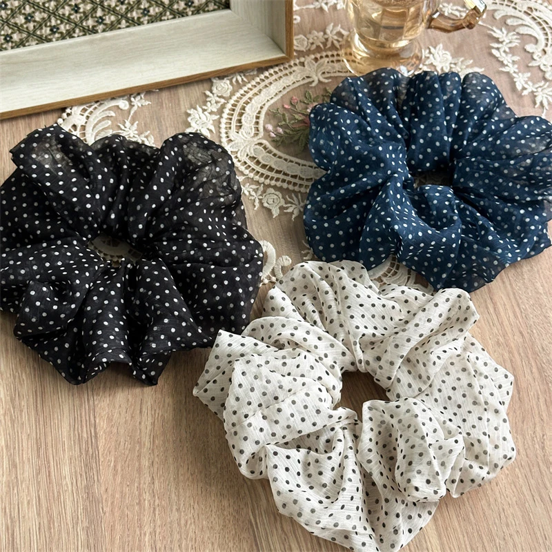 Lightweight Polka-Dot Sheer Scrunchies Offer Delicate Retro Charm With Breathable Mesh Material For Comfortable Styling
Lightweight Polka-Dot Sheer Scrunchies Offer Delicate Retro Charm With Breathable Mesh Material For Comfortable Styling