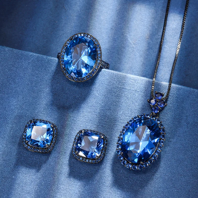 New Jewelry Plated Blue Pointed Crystal Black Gold Personalized Set 13*18-12*16
New Jewelry Plated Blue Pointed Crystal Black Gold Personalized Set 13*18-12*16