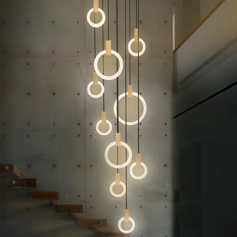 Modern LED stair chandelier lighting Nordic living room ceiling pendant lamps bedroom Acrylic rings fixtures Wood hanging lights
Modern LED stair chandelier lighting Nordic living room ceiling pendant lamps bedroom Acrylic rings fixtures Wood hanging lights