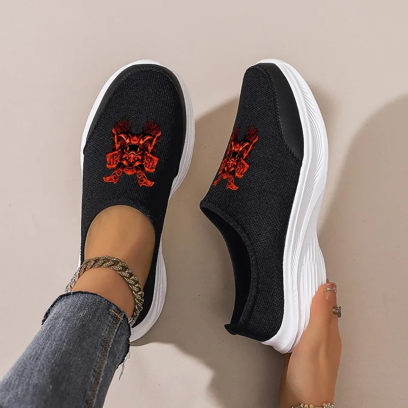 Women's Black Slip-On Platform Sneakers: Breathable Mesh with Red Graphic Design. Casual, Lightweight for Daily & Sports Style.
Women's Black Slip-On Platform Sneakers: Breathable Mesh with Red Graphic Design. Casual, Lightweight for Daily & Sports Style.