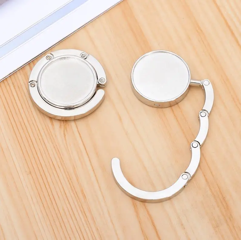 100pcs Party Favors Wholesale Foldable Handbag Hanger Bag Purse Hanger folding Hook Holder for Restaurant Table ni160
100pcs Party Favors Wholesale Foldable Handbag Hanger Bag Purse Hanger folding Hook Holder for Restaurant Table ni160