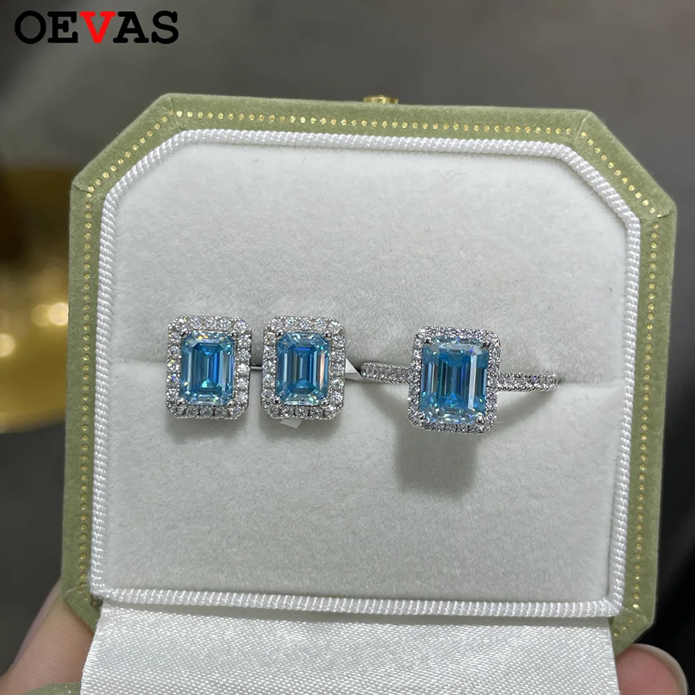 Кольца OEVAS 2CT изумрудной огранки с синим муассанитом и сертификатом GRA, 100% стерлинговое серебро S925, свадебные украшения для женщин, подарки
Кольца OEVAS 2CT изумрудной огранки с синим муассанитом и сертификатом GRA, 100% стерлинговое серебро S925, свадебные украшения для женщин, подарки