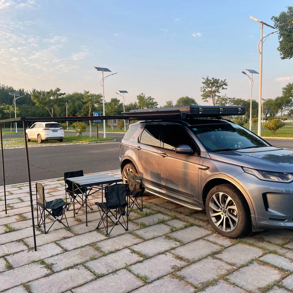 car rooftop tent hard shell with deck awning safari tent with car side awning tenda da tetto per
car rooftop tent hard shell with deck awning safari tent with car side awning tenda da tetto per