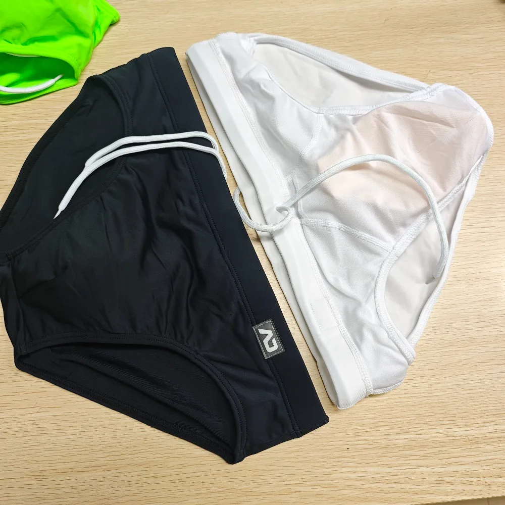 swimming trunks men's low waist bikini briefs Solid color nylon swimming trunks cup anti-embarrassment beach pants tetherBS420
swimming trunks men's low waist bikini briefs Solid color nylon swimming trunks cup anti-embarrassment beach pants tetherBS420