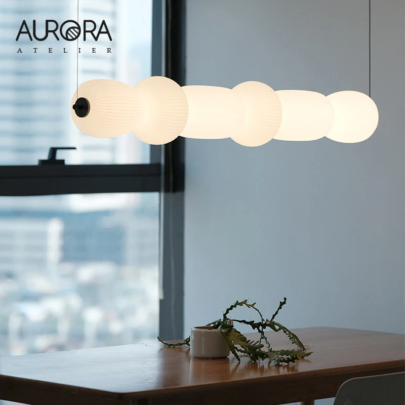 Скандинавская дизайнерская длинная подвесная люстра в современном стиле для ресторана, обеденного стола, гостиной, отеля, бара, интернет-кафе (в форме тыквы)
Скандинавская дизайнерская длинная подвесная люстра в современном стиле для ресторана, обеденного стола, гостиной, отеля, бара, интернет-кафе (в форме тыквы)