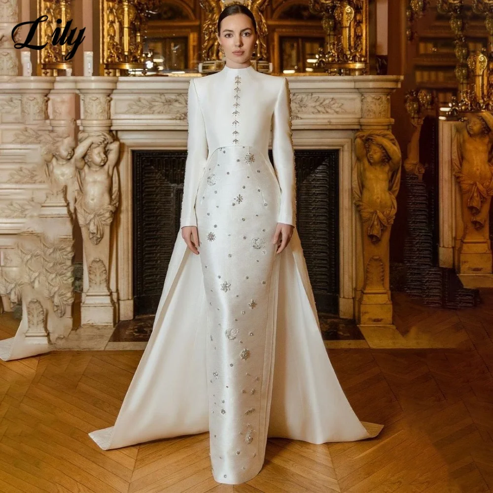 Белое вечернее платье Lily с длинными рукавами, трапециевидное платье для выпускного вечера, вечернее платье с блестками и кристаллами, вечернее платье с длинными рукавами, вечерние платья по индивидуальному заказу
Белое вечернее платье Lily с длинными рукавами, трапециевидное платье для выпускного вечера, вечернее платье с блестками и кристаллами, вечернее платье с длинными рукавами, вечерние платья по индивидуальному заказу