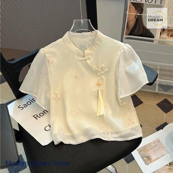 Chinese style national style button-down shirt blouse women's summer fashion temperament short sleeve casual embroidery shirt.
Chinese style national style button-down shirt blouse women's summer fashion temperament short sleeve casual embroidery shirt.