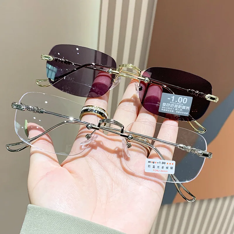 Men Rimless Anti-Blue Light Glasses Photochromic Glasses Women Alloy Frame Ultra Light Computer Goggles Sunglasses 2025
Men Rimless Anti-Blue Light Glasses Photochromic Glasses Women Alloy Frame Ultra Light Computer Goggles Sunglasses 2025