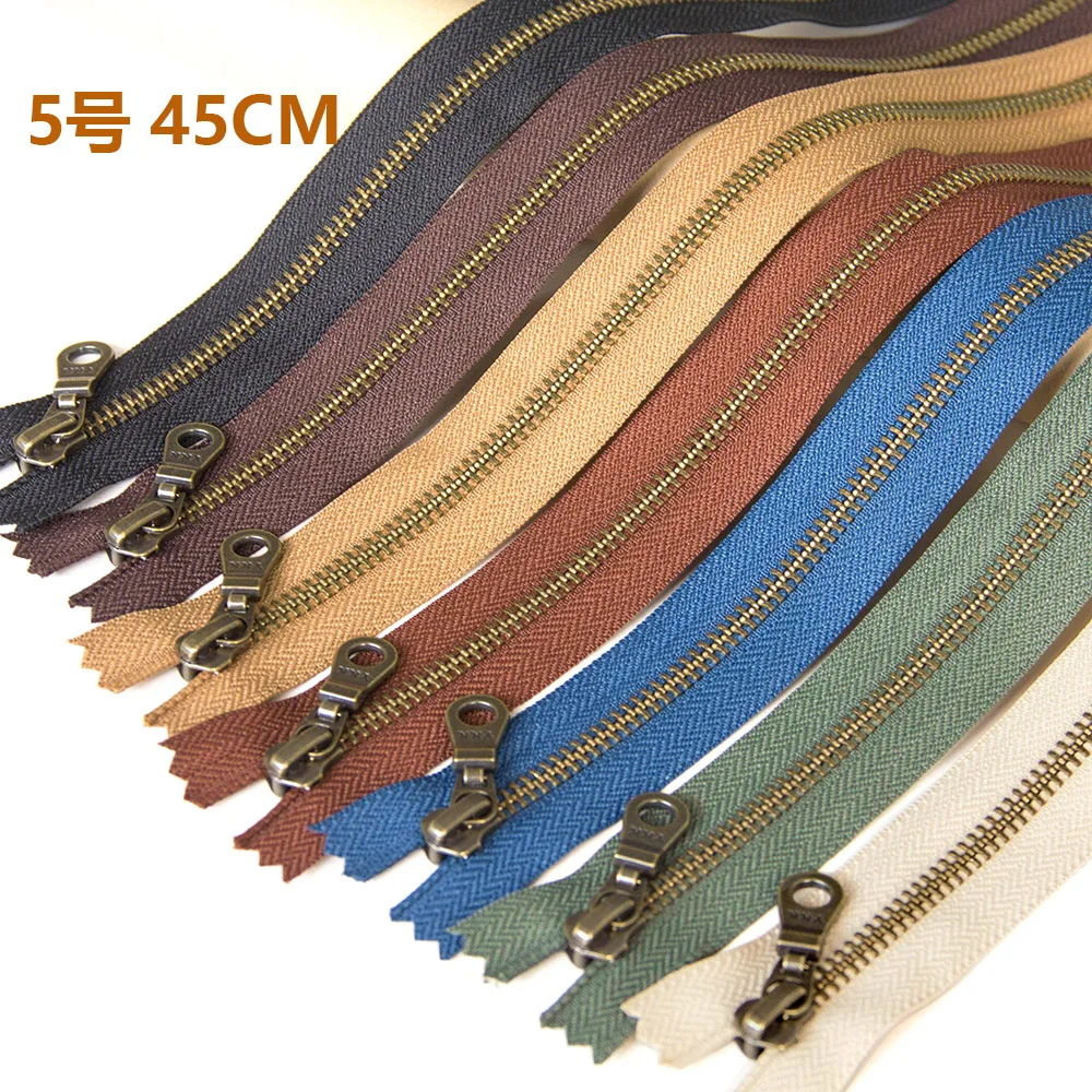 45CM YKK5, metal closed tail zipper, with lock, bronze, leather goods, bags, wallet accessories.
45CM YKK5, metal closed tail zipper, with lock, bronze, leather goods, bags, wallet accessories.