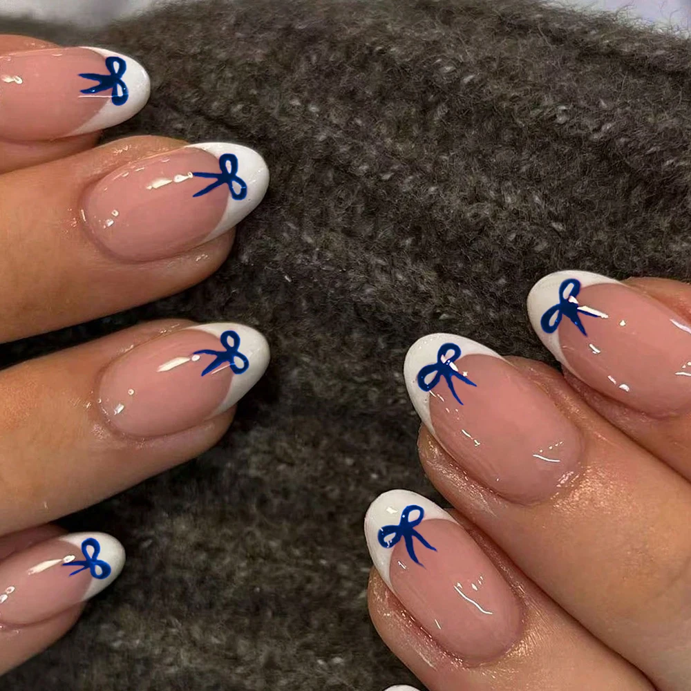 24 pieces of Y2K-style short oval bow-shaped white French manicure stickers
24 pieces of Y2K-style short oval bow-shaped white French manicure stickers