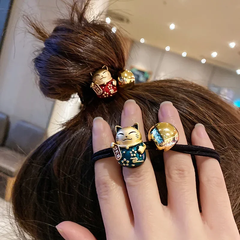 Lucky cat's head rope, simple ponytail headdress, Korean hair accessories, girl Internet celebrity ins, cute leather bands
Lucky cat's head rope, simple ponytail headdress, Korean hair accessories, girl Internet celebrity ins, cute leather bands