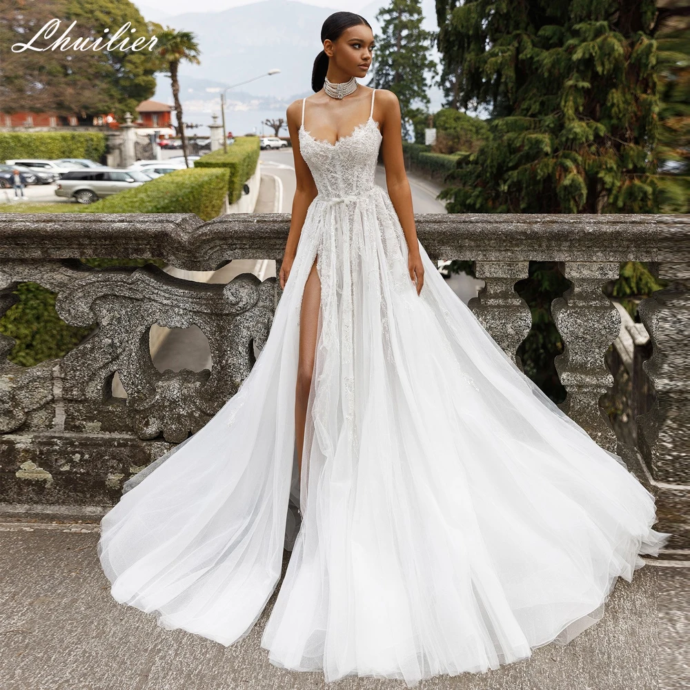 Lhuilier Customized A Line Sexy Lace Wedding Dresses Floor Length Sleeveless Bridal Gowns Court Train with High Slit
Lhuilier Customized A Line Sexy Lace Wedding Dresses Floor Length Sleeveless Bridal Gowns Court Train with High Slit