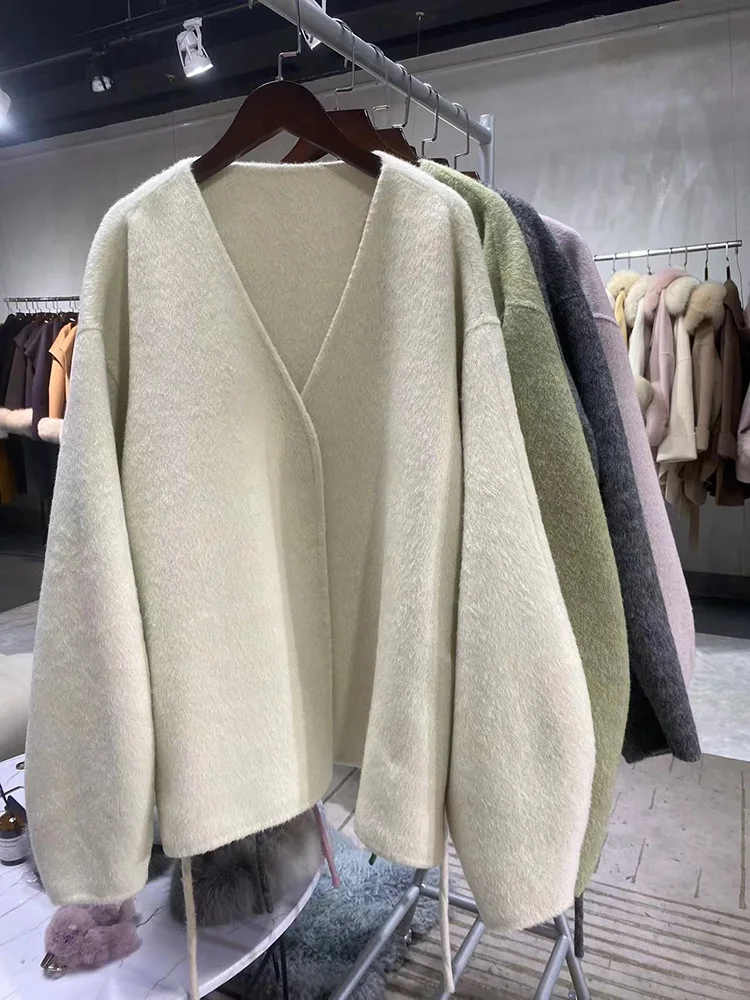 High-end Double-sided Woolen Coat Female Short New Autumn Winter V-neck Puff Sleeve Wool Silk Coat Loose Lace-up Women Outerwear
High-end Double-sided Woolen Coat Female Short New Autumn Winter V-neck Puff Sleeve Wool Silk Coat Loose Lace-up Women Outerwear