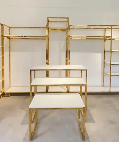 Высококачественные полки для витрин женской одежды из нержавеющей стали, напольные полки для витрины магазина одежды
Высококачественные полки для витрин женской одежды из нержавеющей стали, напольные полки для витрины магазина одежды