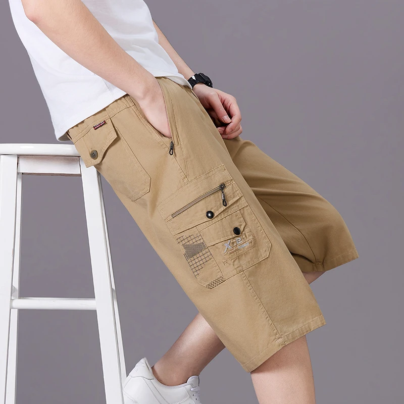 Летние мужские укороченные шорты, рабочие шорты с множеством карманов, на молнии, из хлопка, облегающие, для мужчин среднего возраста, повседневные, пляжные брюки.
Летние мужские укороченные шорты, рабочие шорты с множеством карманов, на молнии, из хлопка, облегающие, для мужчин среднего возраста, повседневные, пляжные брюки.