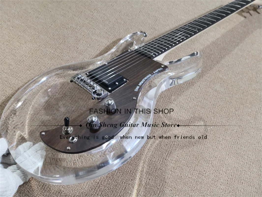 6-string Electric Guitar, Acrylic Clear Body, Rosewood Fretboard, Rosewood pickguard, Chrome Bridge
6-string Electric Guitar, Acrylic Clear Body, Rosewood Fretboard, Rosewood pickguard, Chrome Bridge