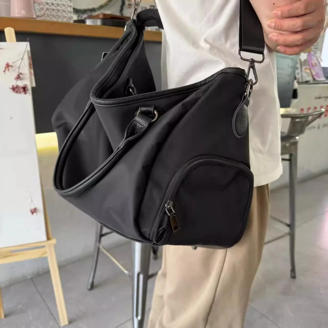 Versatile Large Capacity Lightweight Crossbody Bag for Men And Women Travel Business Fitness Sports Shoulder Handheld Bag
Versatile Large Capacity Lightweight Crossbody Bag for Men And Women Travel Business Fitness Sports Shoulder Handheld Bag