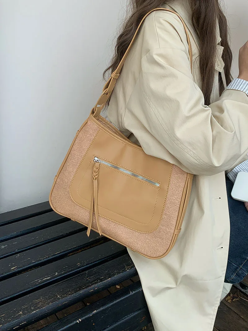 TRSYPHXM Autumn and winter new retro fashion contrasting saddle bag niche bag women's versatile casual shoulder crossbody bag
TRSYPHXM Autumn and winter new retro fashion contrasting saddle bag niche bag women's versatile casual shoulder crossbody bag