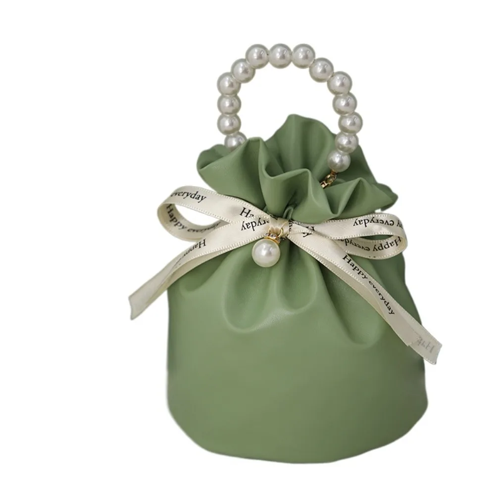 Solid Color PU Drawstring Bag Korean Style Storage Bag Festive Sugar Bag Jewelry Packing Bag Bucket Bag Pearls Handle Wrist Bag
Solid Color PU Drawstring Bag Korean Style Storage Bag Festive Sugar Bag Jewelry Packing Bag Bucket Bag Pearls Handle Wrist Bag