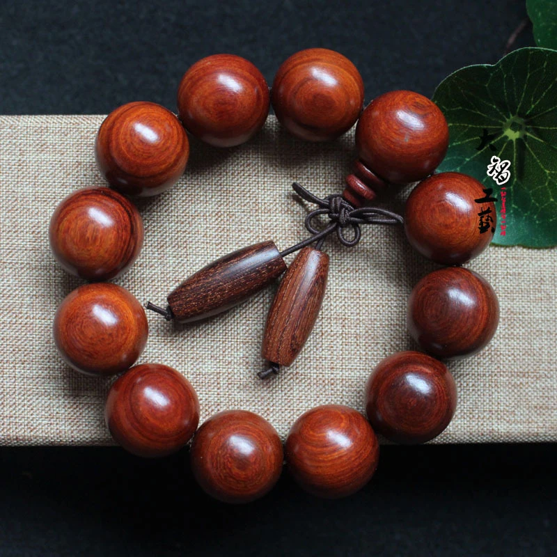 Small-leaf red sandalwood bracelet with dzi beads, wooden Buddhist bead bracelet, popular redwood jewelry for men and women
Small-leaf red sandalwood bracelet with dzi beads, wooden Buddhist bead bracelet, popular redwood jewelry for men and women