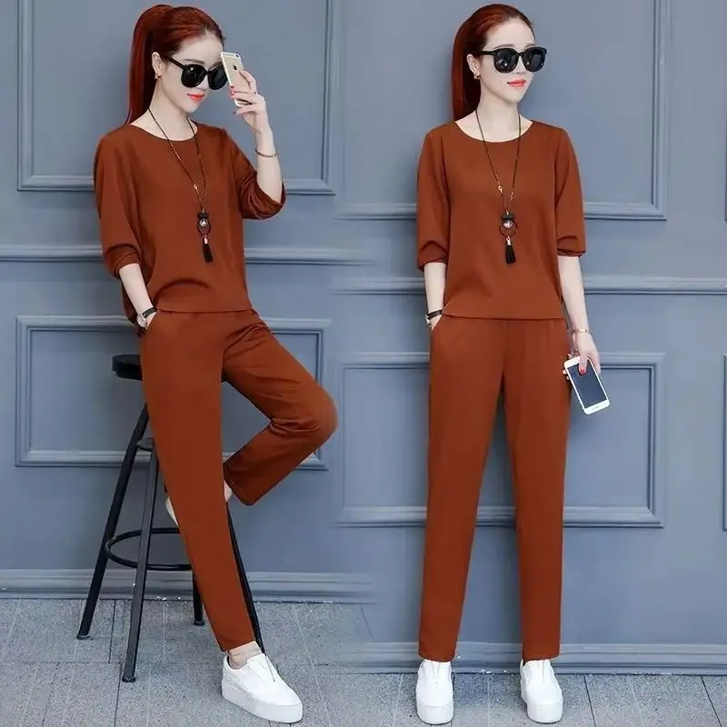Women's 2025 New Spring Summer Casual Suit Korean Fashion Half Sleeve T-shirt Tops Harlan Pencil Pants 2 Two Piece Sets Clothing
Women's 2025 New Spring Summer Casual Suit Korean Fashion Half Sleeve T-shirt Tops Harlan Pencil Pants 2 Two Piece Sets Clothing