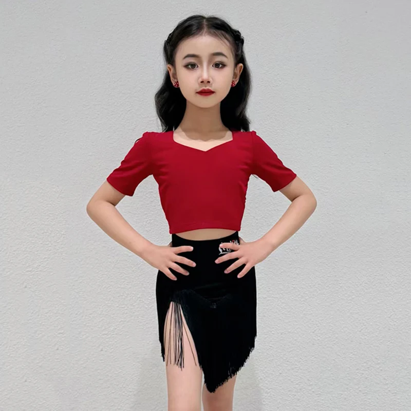 2026 Girls Latin Dance Training Clothes Short Sleeve Red Tops Black Fringe Skirt Kid Cha Cha Dance Outfit Practice Wear VBH2845
2026 Girls Latin Dance Training Clothes Short Sleeve Red Tops Black Fringe Skirt Kid Cha Cha Dance Outfit Practice Wear VBH2845