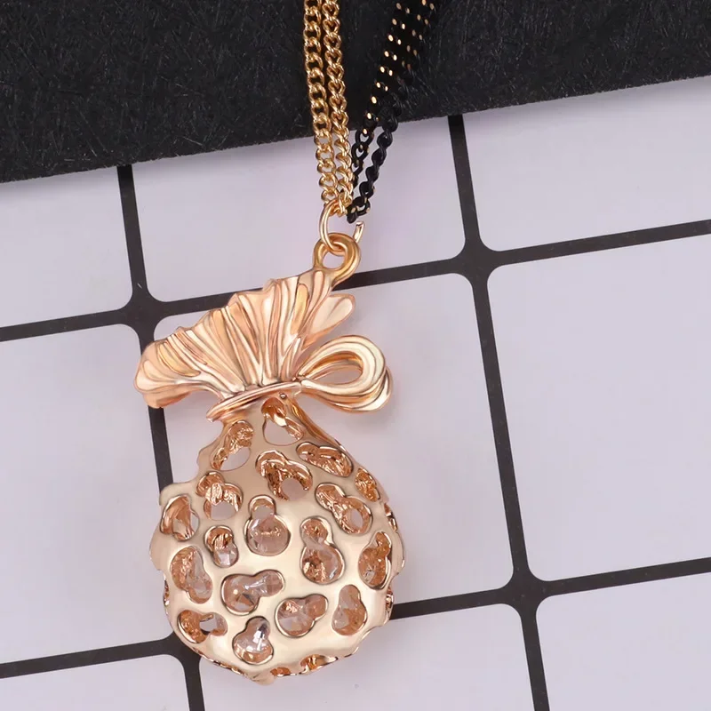 Длинное ожерелье Lucky Money Bag, женская цепочка для свитера с кристаллами, модное ожерелье для одежды, ретро-колье
Длинное ожерелье Lucky Money Bag, женская цепочка для свитера с кристаллами, модное ожерелье для одежды, ретро-колье