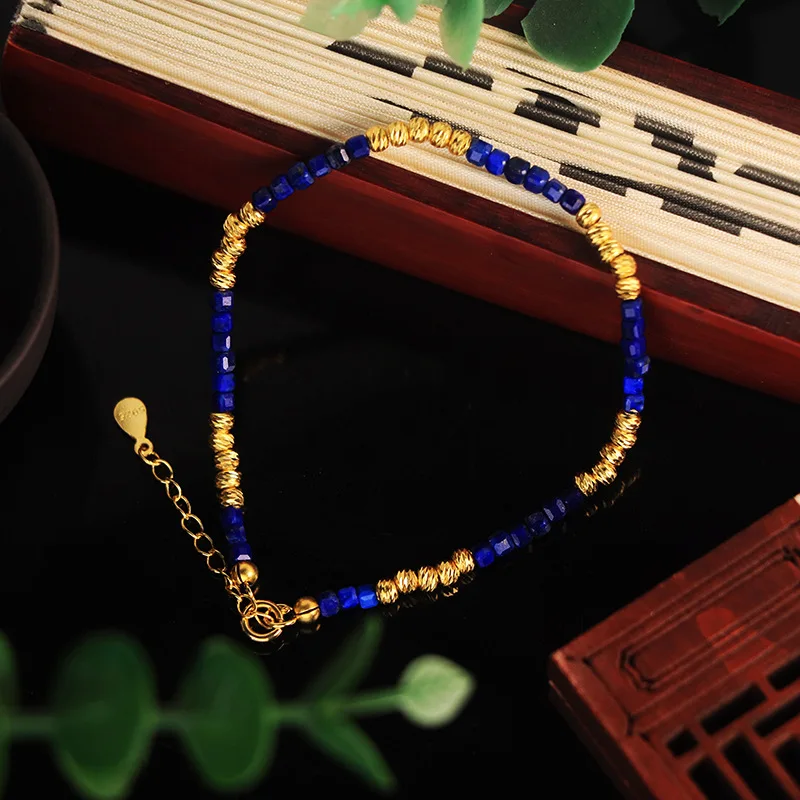 Ожерелье-чокер из лазурита и золотых бусин – яркое украшение в богемном стиле
Ожерелье-чокер из лазурита и золотых бусин – яркое украшение в богемном стиле