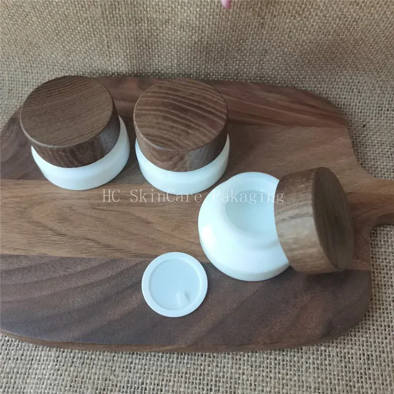 fashion quality Jars With Lid For Cosmetics White Porcelain Glass Jar with Dark Wood Bamboo Lid Eco Friendly Cosmetic Container
fashion quality Jars With Lid For Cosmetics White Porcelain Glass Jar with Dark Wood Bamboo Lid Eco Friendly Cosmetic Container