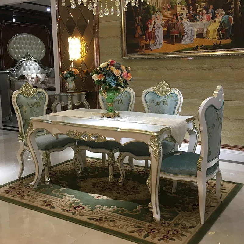 European style dining table and chair combination solid wood rectangular dining table 6-person dining room carved rice table can
European style dining table and chair combination solid wood rectangular dining table 6-person dining room carved rice table can